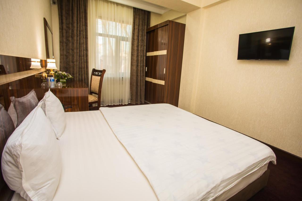 Hotel Grand Capital Tasjkent Buitenkant foto